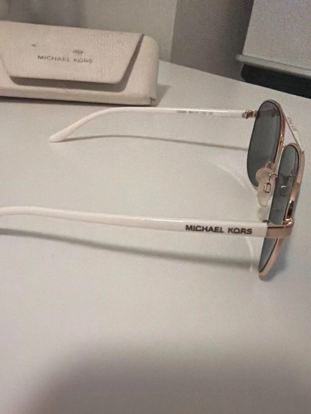 Michael Kors blue mirror